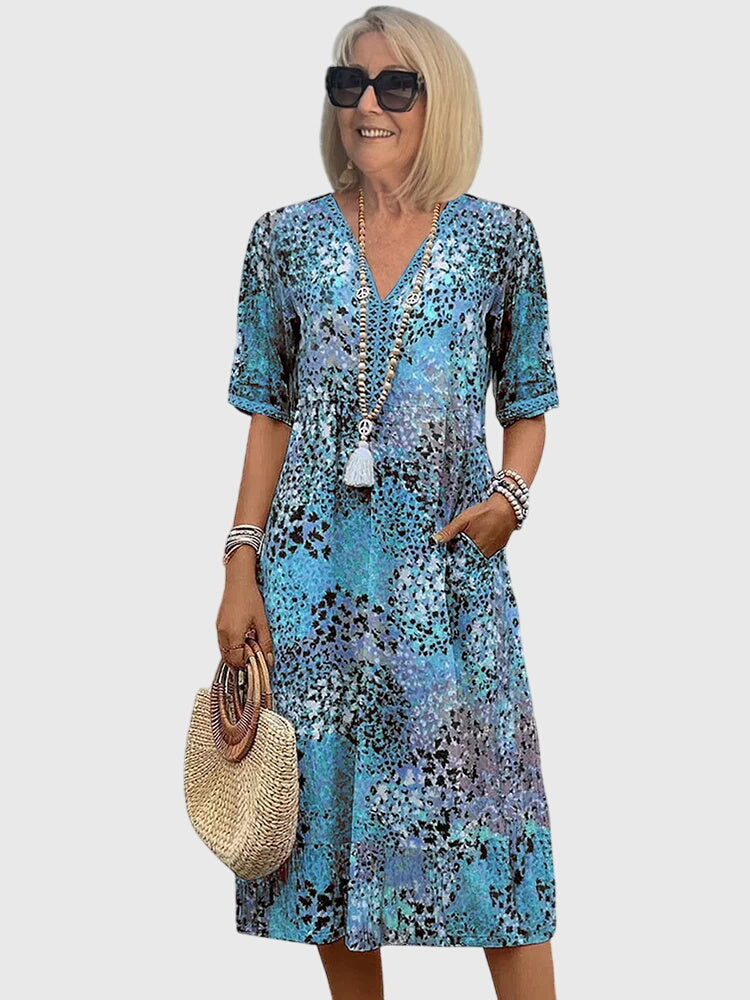 Bella — Robe Midi Florale Élégante